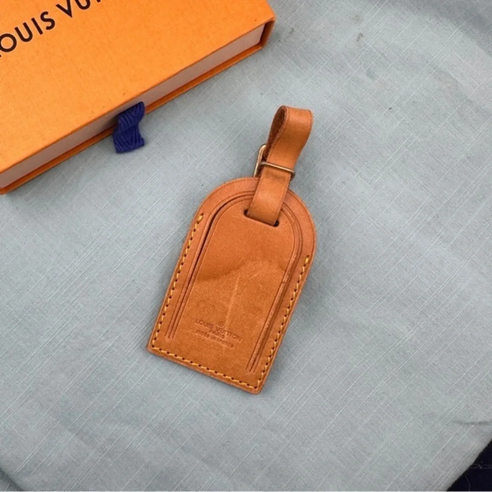 AUTHENTIC Vachetta Leather Luggage tag and loop.